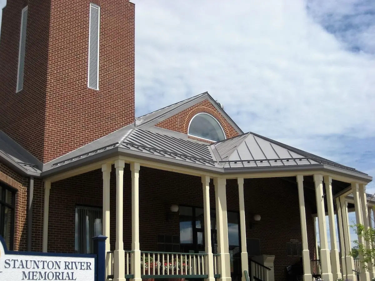 Skilled roofing craftsmen working on a residential roof in The Ohio State University